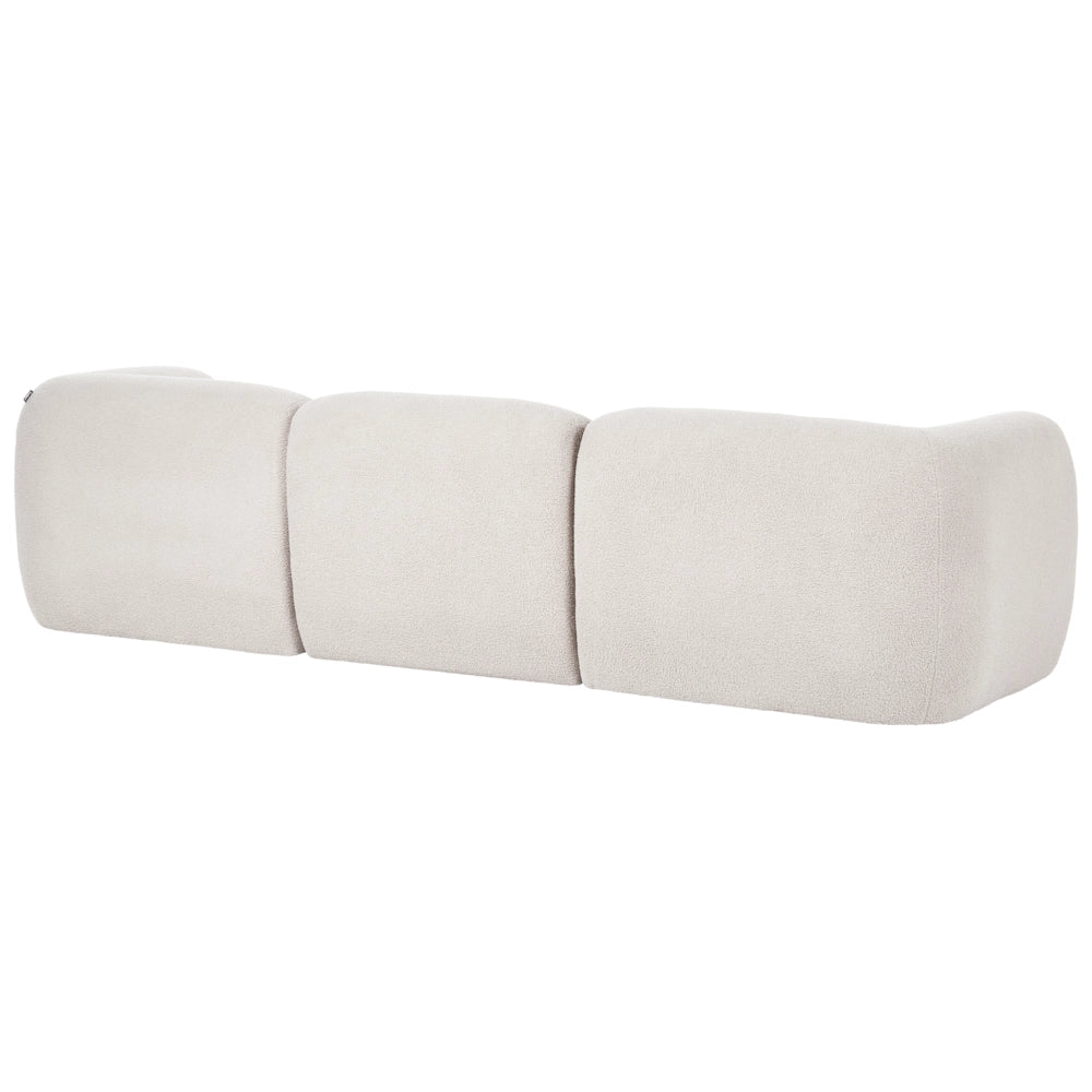 Divano modulare bouclé a tre posti profilo ribassato forma organica bianco sporco