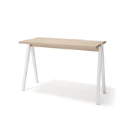 Scrivania Herdasa effetto noce chiaro gambe faggio in bianco 75x120x60