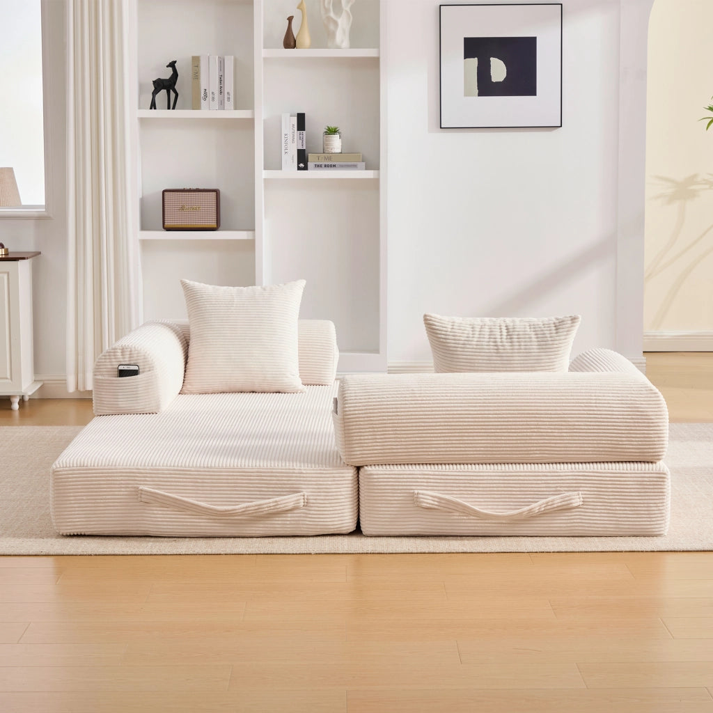 Divano modulare beige in velluto a coste con struttura in metallo; tasca laterale e 3 cuscini
