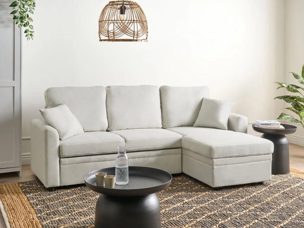 Divano letto angolare con contenitore lato sinistro beige chiaro rivestimento in poliestere effetto lino contenitore cuscini design moderno