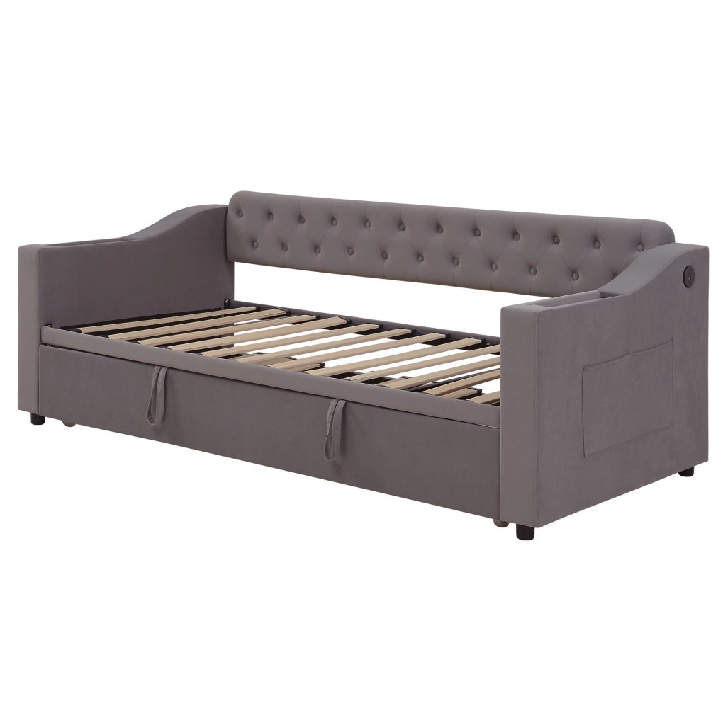 Divano letto imbottito estraibile 90x190 cm in velluto grigio con porte USB e vani contenitore