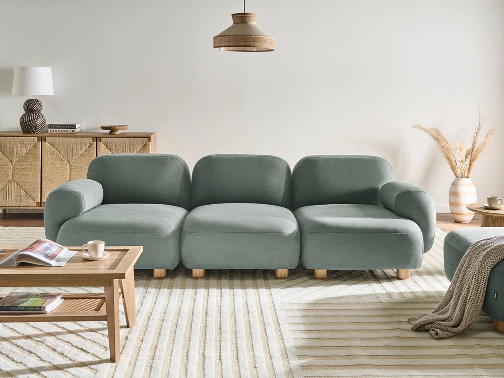 Divano componibile a 3 posti in tessuto due moduli angolari gambe in legno verde chiaro stile moderno