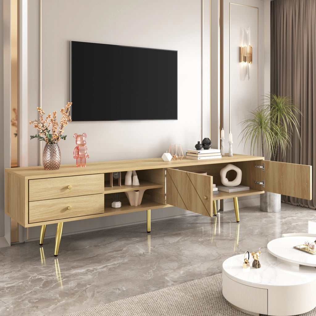 Mobile TV da 160 cm con piedini dorati, due cassetti e ante dal design unico.