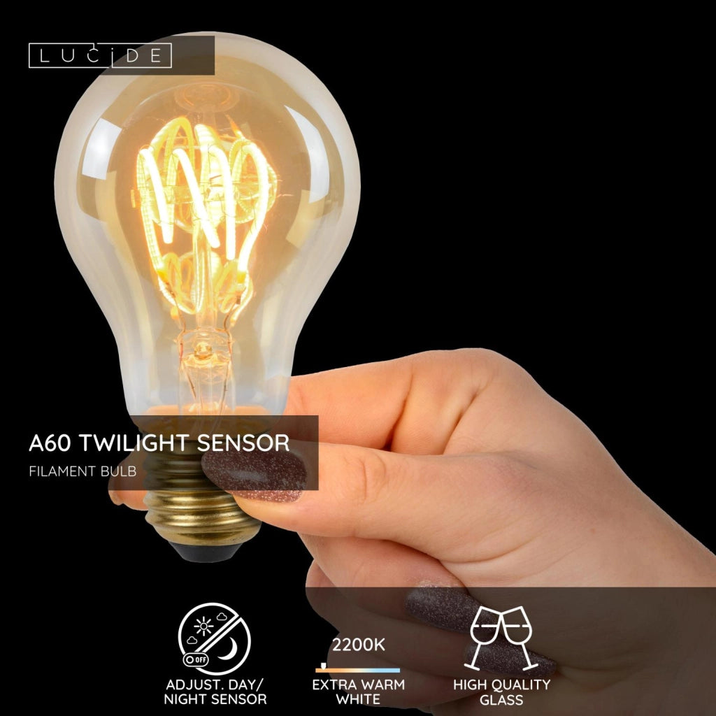 Lampadina LED filamento crepuscolare E27 ambra Lucide