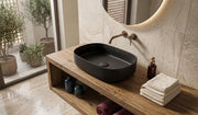 Lavabo ovale da appoggio senza troppo pieno in ceramica senza foro rubinetto - Nero Opaco
