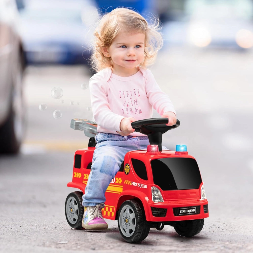 Macchina Cavalcabile per Bambini, Camion Pompieri Realistico con Sedile, Pistola a Bolle d'Aria, Musica, Sirena e Luci di Emergenza, Carica 20 KG, Macchina per Bambini da 18-36 Mesi (Stile A)
