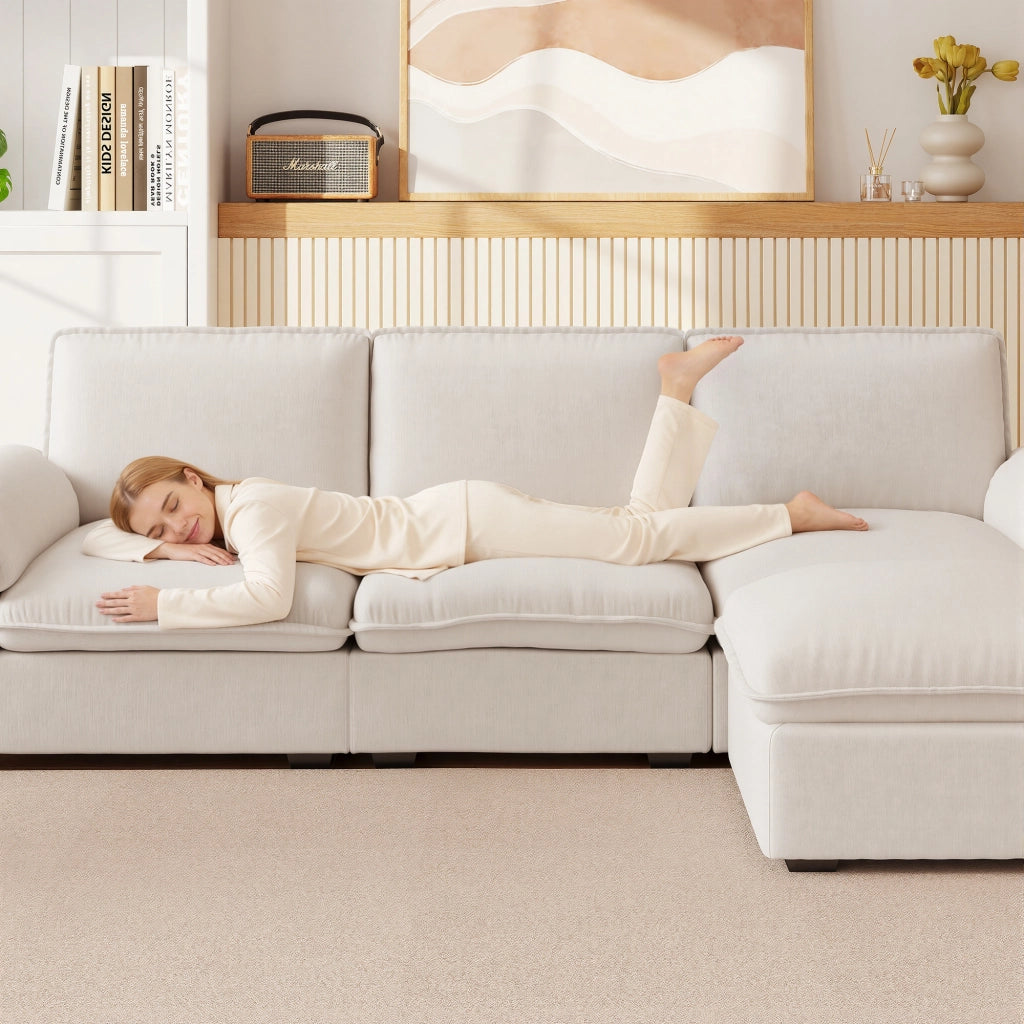 Divano angolare modulare 4 posti con ottomana configurabile cuscini di supporto design ergonomico in chenille beige