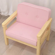 Poltroncina rosa per bambini con rivestimento effetto velluto