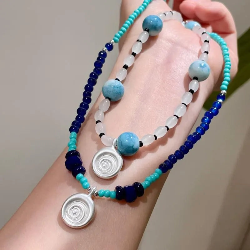 Collana con ciondolo a forma di conchiglia in pietra naturale: gioielli boho con perline