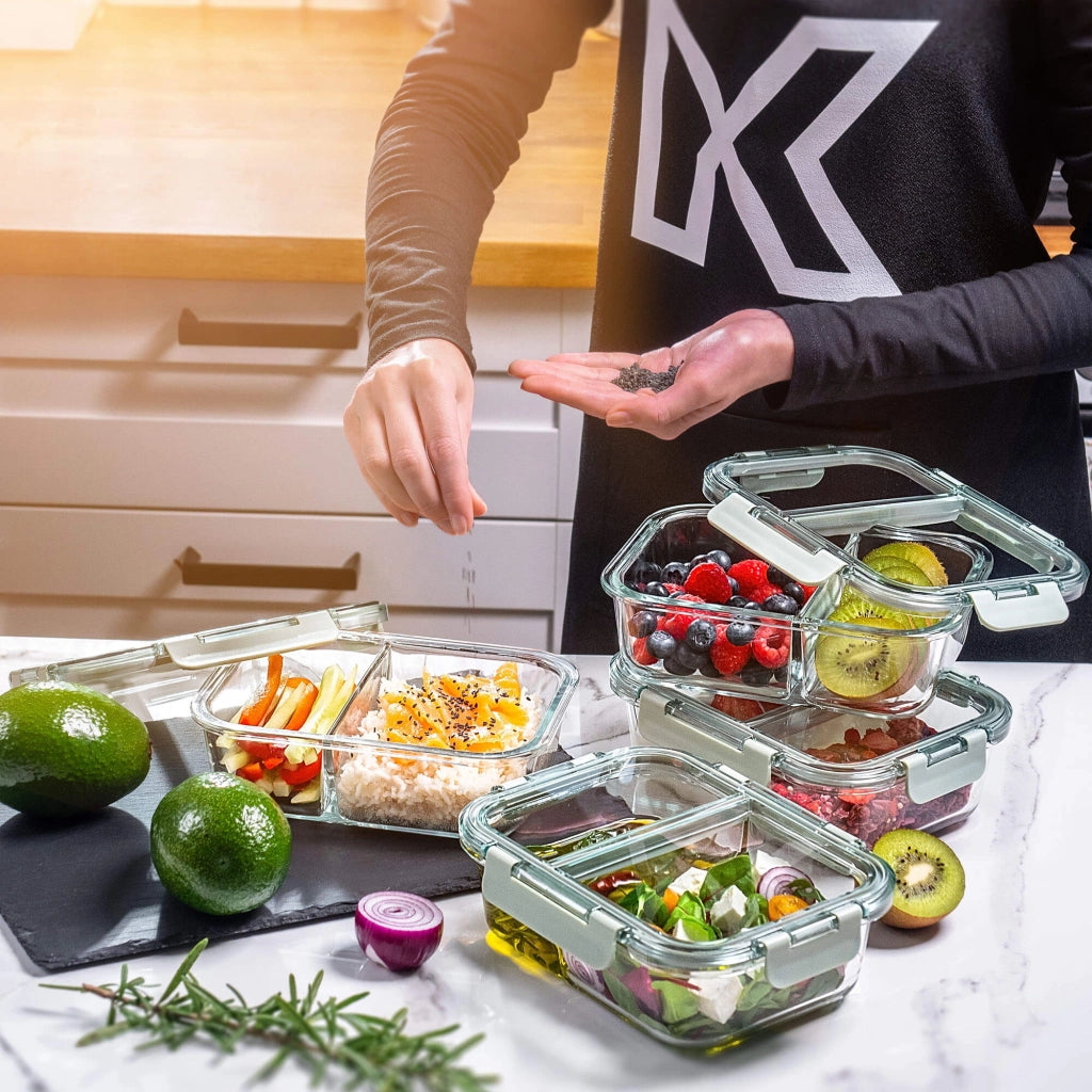 Set di 4 contenitori per alimenti in vetro KADAX da 1 litro con divisori, ideali per il pranzo.