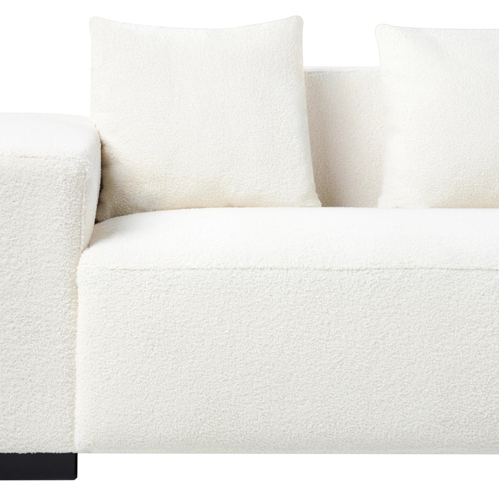 Divano angolare 4 posti in tessuto bouclè bianco lato sinistro forma a L stile elegante