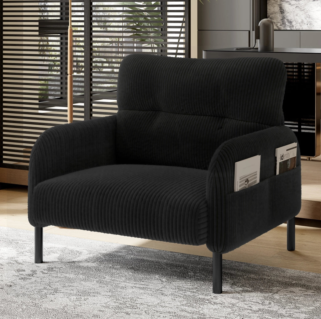 Poltrona singola nera in velluto a coste con tasca laterale e schienale ergonomico confortevole