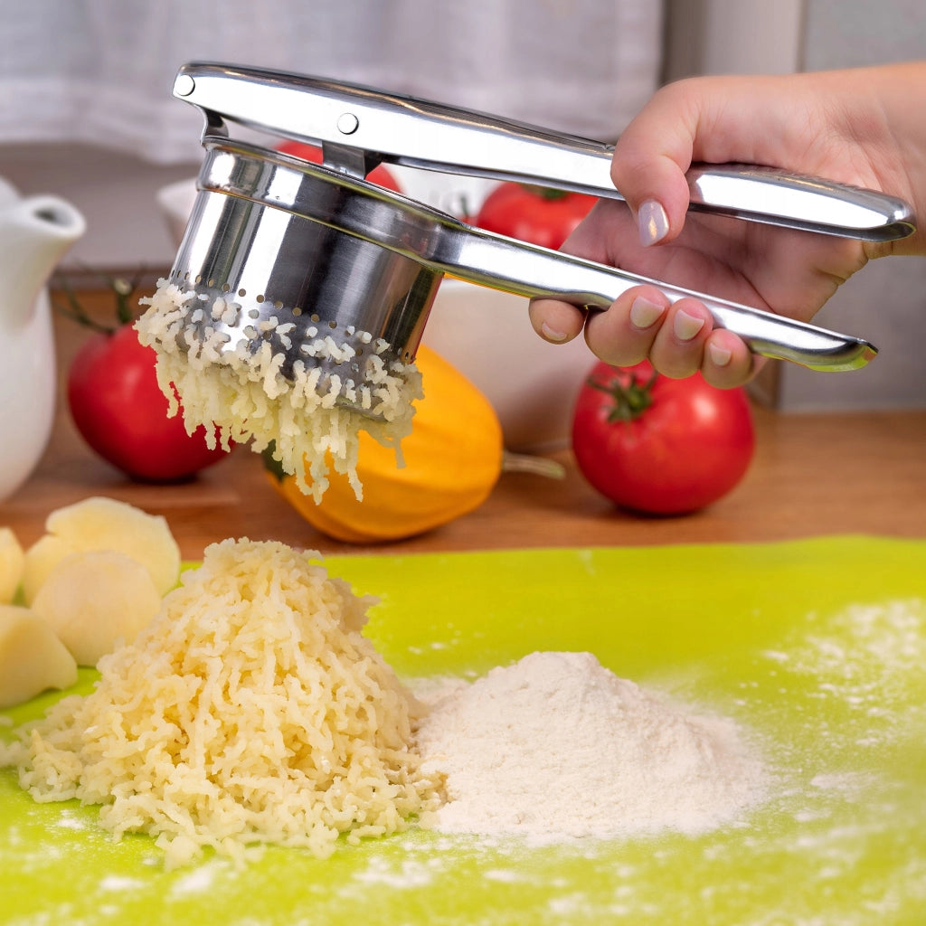 Spremiagrumi manuale KADAX per succhi di frutta e vino, in acciaio inox.