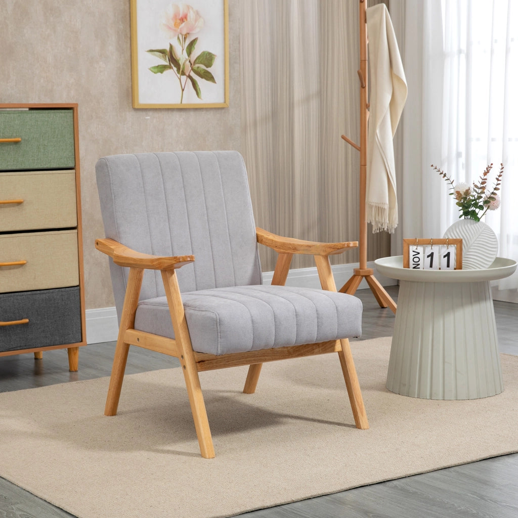 Poltrona lounge in stile scandinavo con braccioli, tessuto effetto velluto e gambe in legno di gomma, grigio chiaro
