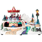 Trade Shop - Giostrina Natalizia Il Parco Giochi Incantato H16,5 Cm Con Luci Suoni Movimento Addobbo -