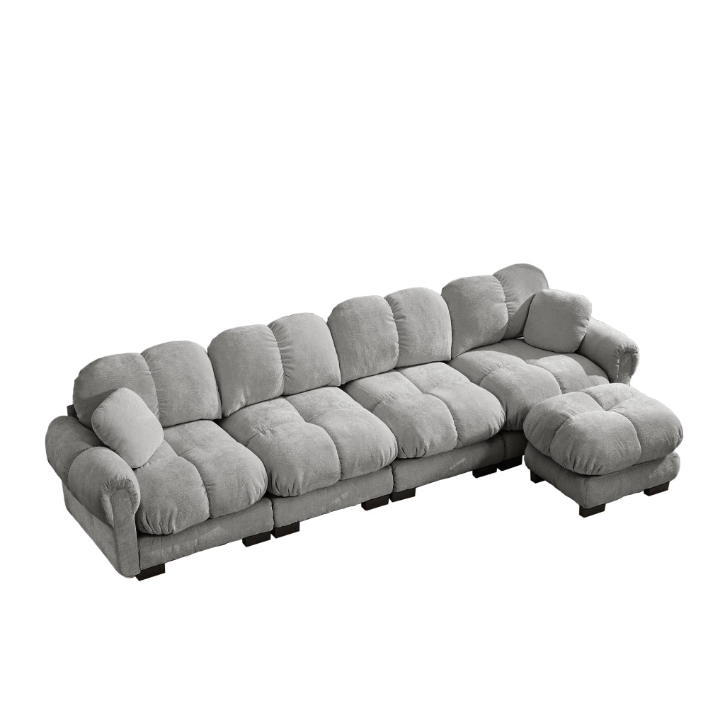 Divano angolare modulare 4 posti con chaise longue mobile e cuciture trapuntate in ciniglia grigio chiaro