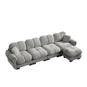 Divano angolare modulare 4 posti con chaise longue mobile e cuciture trapuntate in ciniglia grigio chiaro