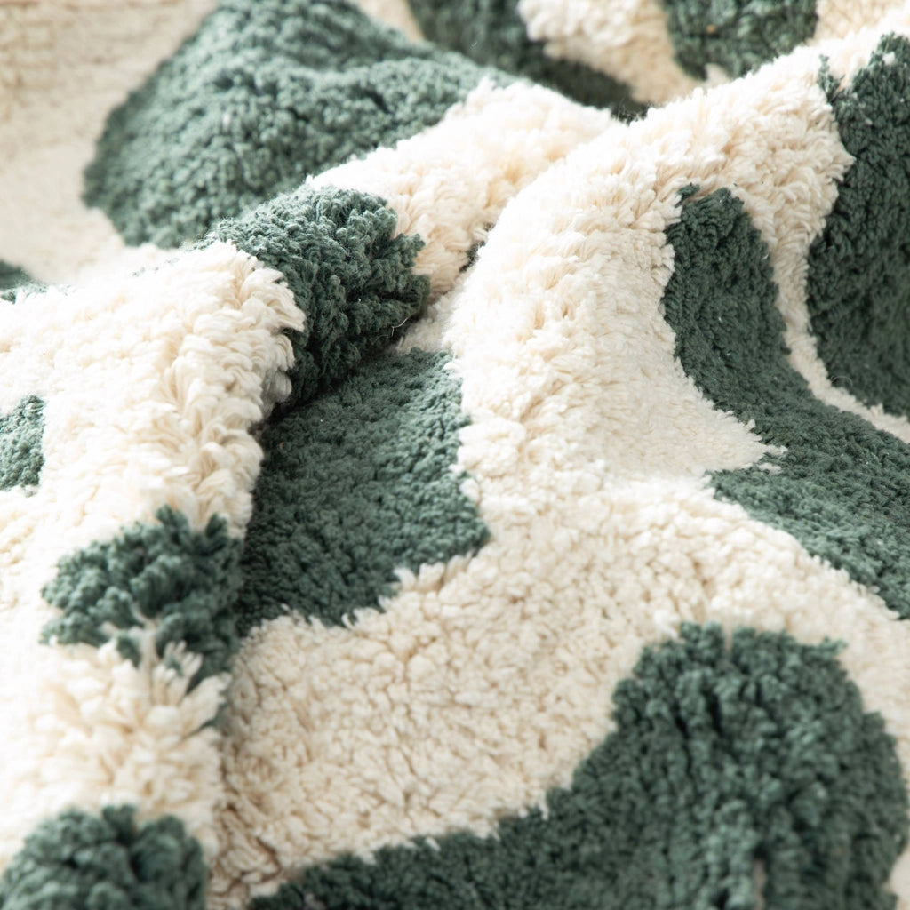 Tappeto interno cotone motivo maculato verde scuro con frange