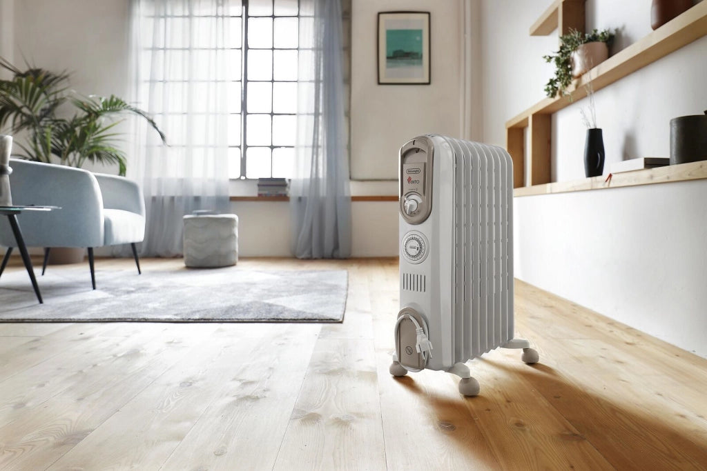 De'Longhi V550918T.WB Serie Vento Radiatore ad Olio 9 Elementi 1800W Timer Antigelo per ambienti fino a 54 m² colore Bianco