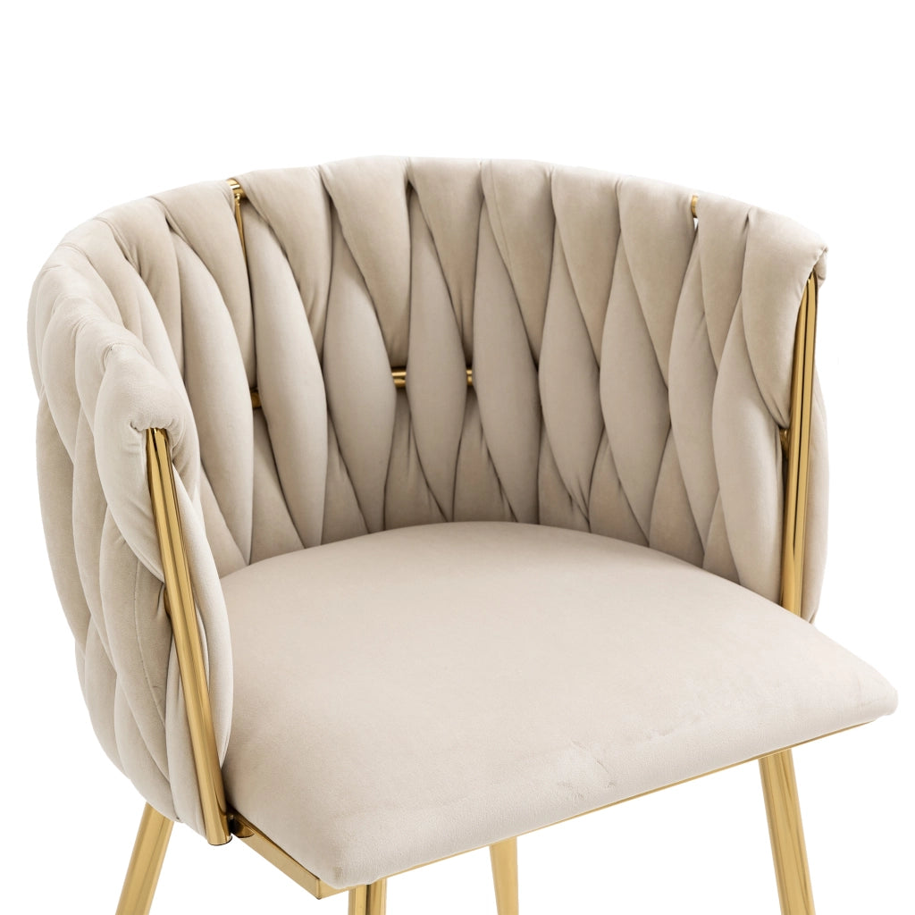 Sedia imbottita in velluto color avorio con gambe in metallo dorato, design curvo e struttura stabile