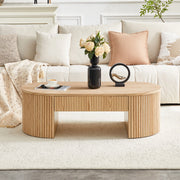 Tavolino basso ovale con cassetto e vano aperto frontali zigrinati in MDF effetto rovere chiaro per soggiorno 118 × 65 × 17 cm