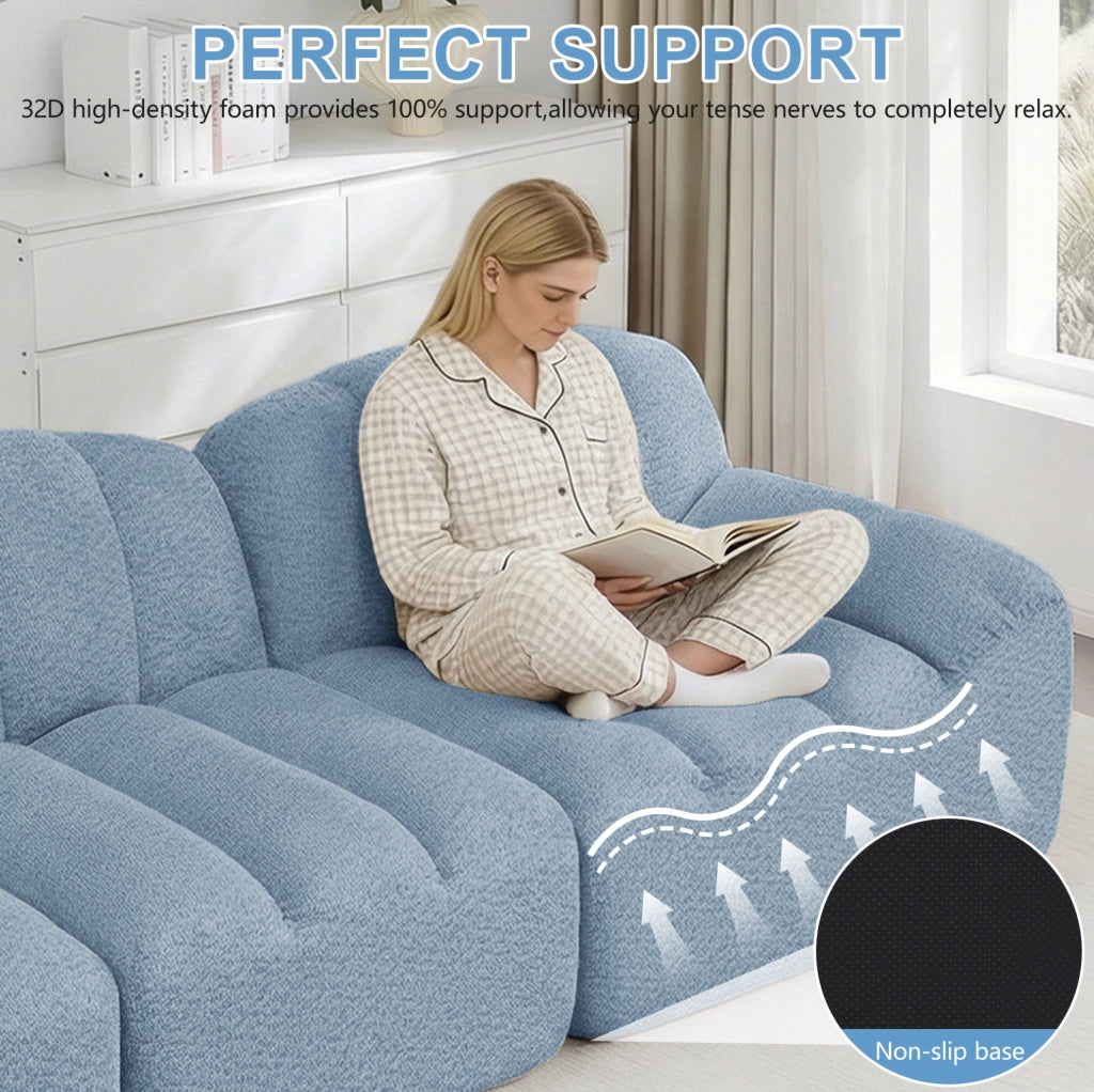 Divano modulare 2 posti blu senza struttura, con cuscini profondi e forma ergonomica a conchiglia