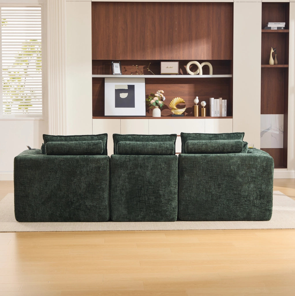 Divano componibile con pouf 256x161x75 cm in ciniglia verde; tasche laterali e cuscini