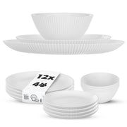 Set di stoviglie KADAX composto da 12 piatti bianchi.