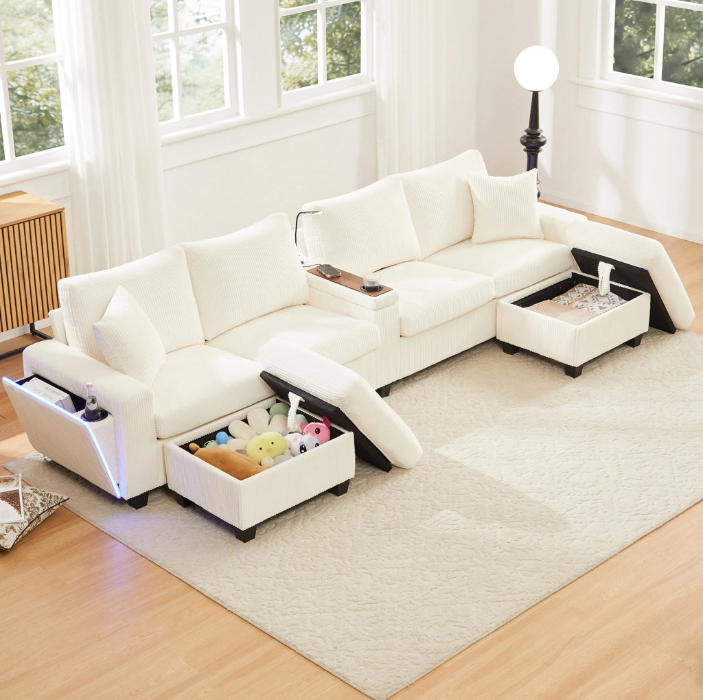 Divano a U 334x128,5 cm in velluto a coste beige con LED, USB/Type-C e 2 pouf