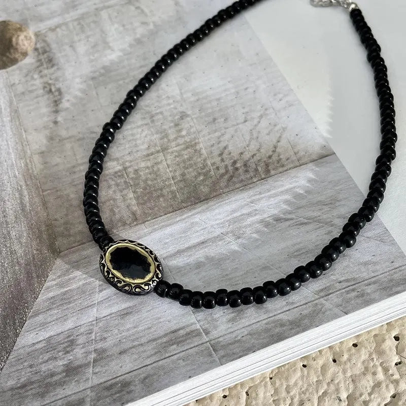 Collana vintage barocca con perline nere e oro, regalo di Natale o compleanno.