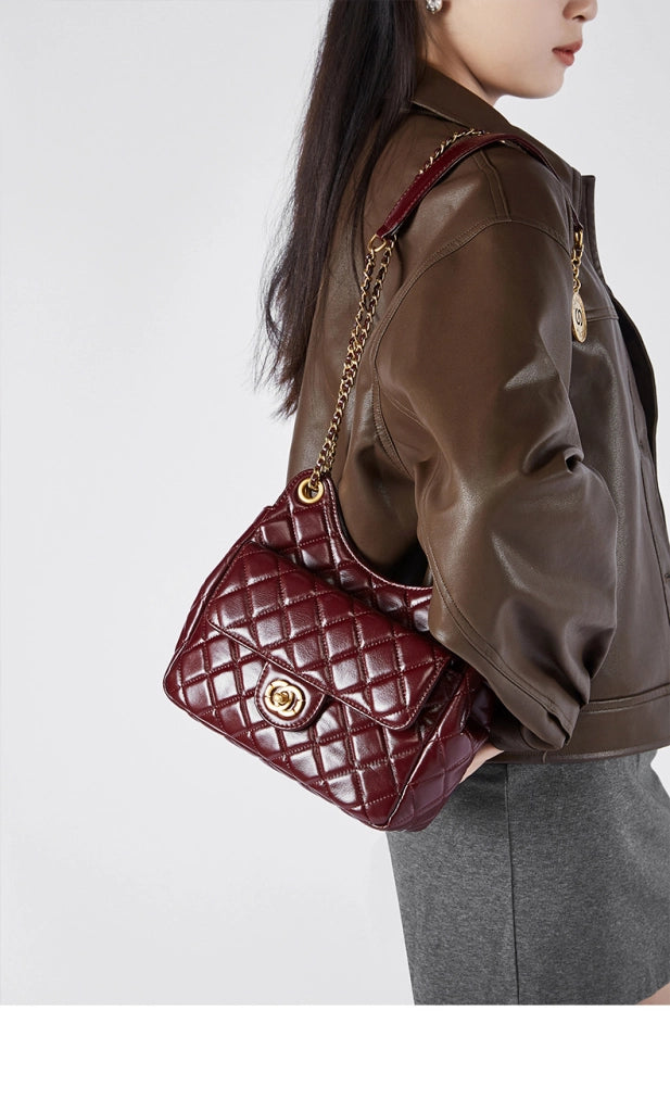 Borsa a tracolla da donna in vera pelle, colore viola.