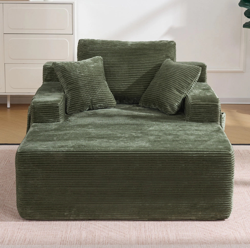 Divano letto compatto in corduroy verde con tasche laterali e cuscini; seduta con schiuma ad alta densit脿