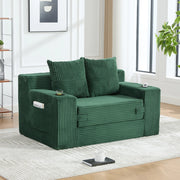 Divano pouf 151x133x64 cm con tasche laterali in velluto a coste smeraldo