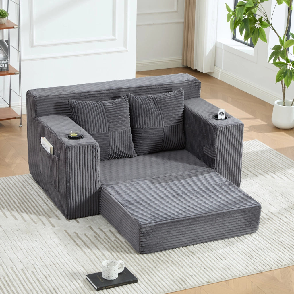 Pouf divano 151x133x64 cm in velluto a coste grigio con tasche laterali e 2 cuscini