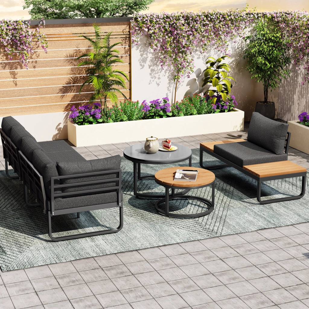 Set mobili da giardino in ferro grigio con 2 tavolini impilabili e cuscini inclusi