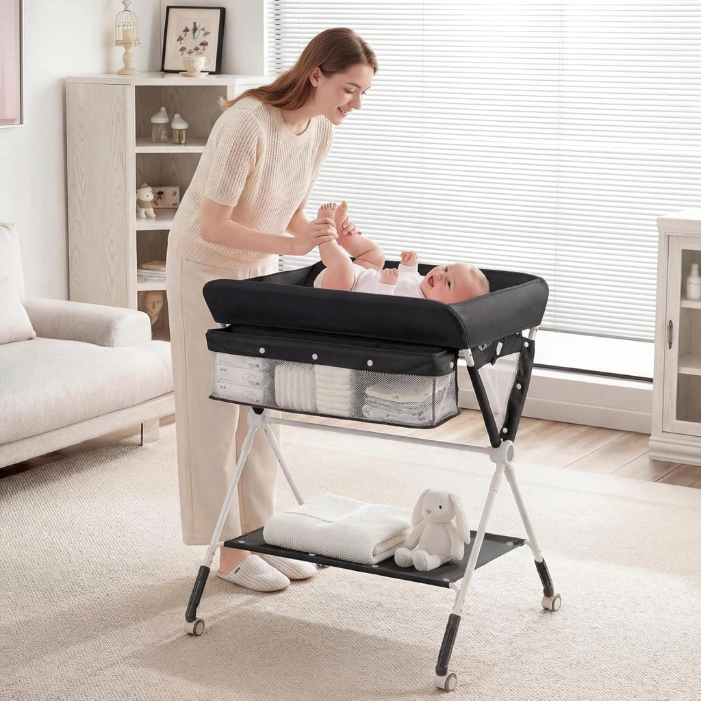 Fasciatoio Pieghevole per Bambini, Fasciatoio Portatile con Altezza Regolabile a 3 Livelli, Fasciatoio Neonato con Ruote di Bloccabili, Ripiano, Porta Asciugamani, per 0-12 Mesi (Nero)