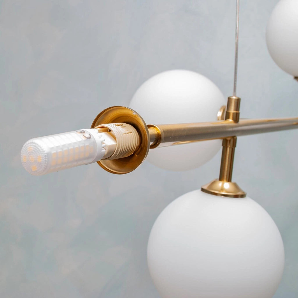 Lampadario moderno a sospensione con 6 sfere ed attacchi per lampadine LED G9