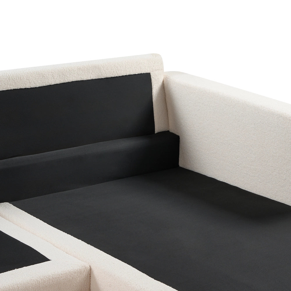 Divano angolare sinistro Rivestimento in bouclé bianco Gambe in legno Elegante