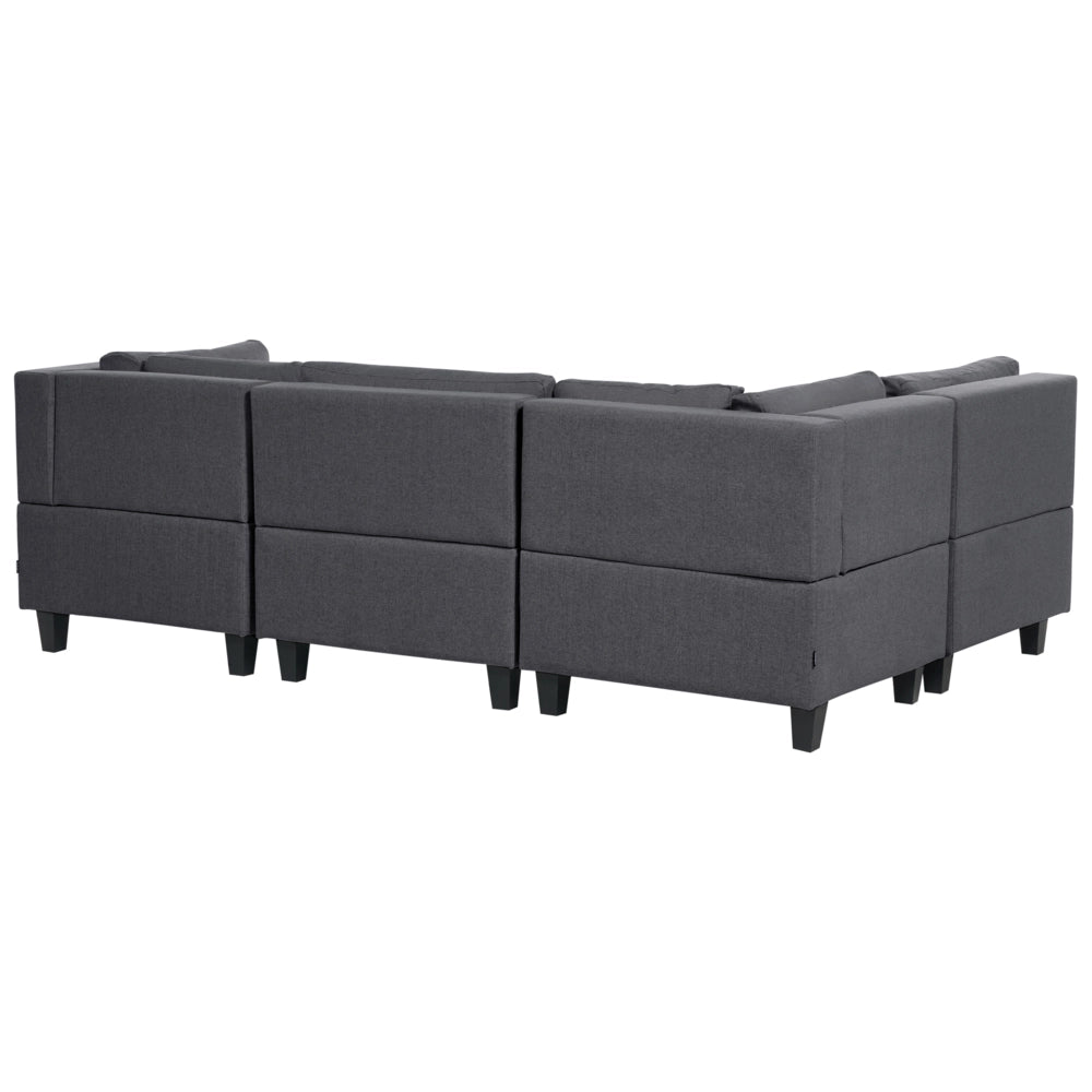 Divano componibile a 4 posti imbottito in tessuto grigio scuro gambe nere lato destro con ottomana stile moderno