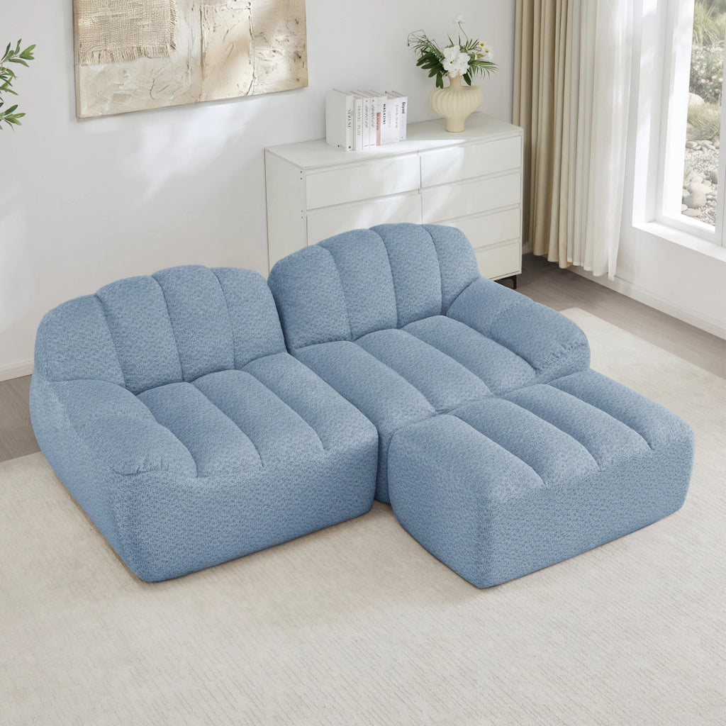 Divano modulare 210x165x79 cm senza struttura con pouf; fleece granulato blu