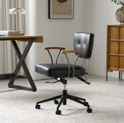 Sedia da ufficio in pelle nera con base in metallo e ruote silenziose