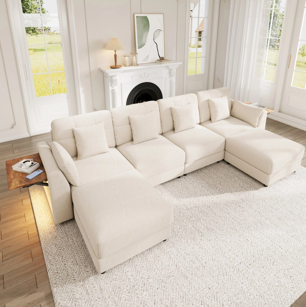 Sofa modulare U/L in chenille beige con LED; 2 pouf mobili e tavolino ribaltabile