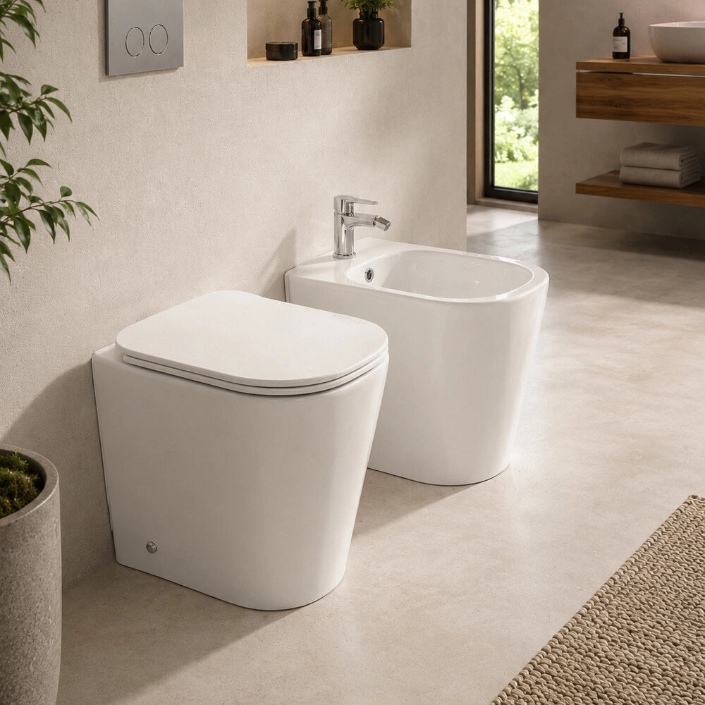 Sanitari filo muro profondità 48cm con scarico a terra tornado e sedile soft close Atami