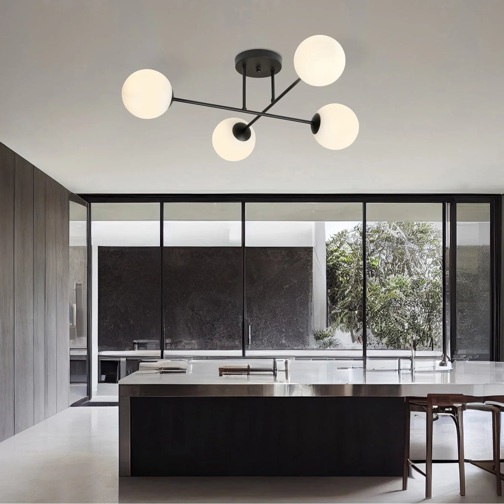 Plafoniera Moderna Morrigan 4 Luci In Acciao Nero E Sfere In Vetro Bianco