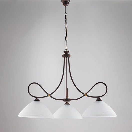 Dallas - Lampadario in ferro laccato nero con decoraz. effetto ruggine e rifiniture oro antico con diffusori in vetro d. 13 alabastro bianchi 3 luci