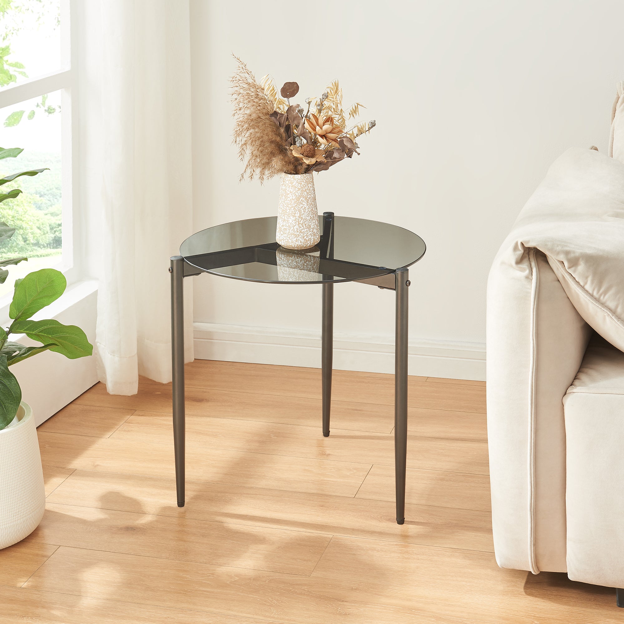 Tavolino Laterale Ulökantaa con Piano Rotondo in Vetro Fumé - Grigio [en.casa]