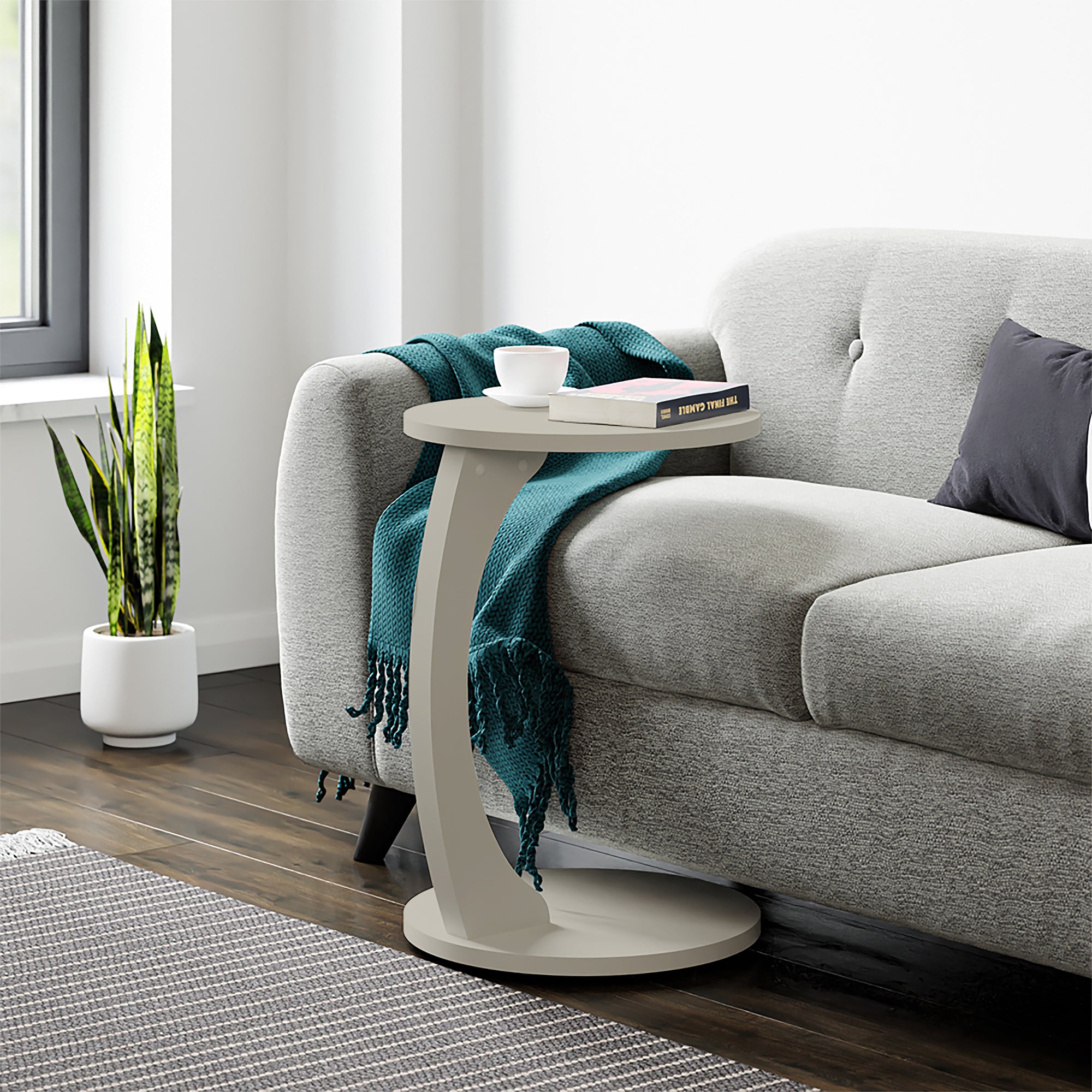 Tavolino da Divano Holeby con Rotelle e Piano Rotondo - Colore Arenaria [en.casa]