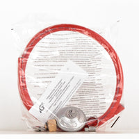 Regolatore a gas con tubo flessibile