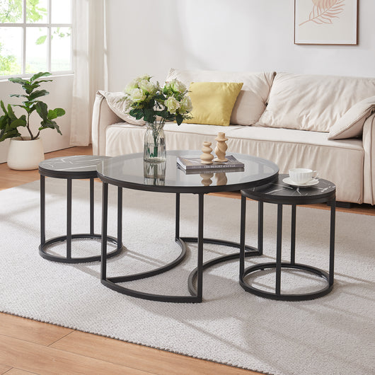 Set Kokkola 3 Tavolini Sovrapponibili con Piani Rotondi in Vetro Fumè e MDF Effetto Marmo Nero [en.casa]