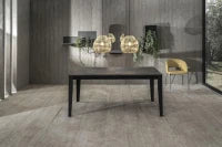 E-STYLO Tavolo allungabile con top cemento grigio in melaminico e base in metallo nero, 80cm X 130/ 290cm H. 76cm.